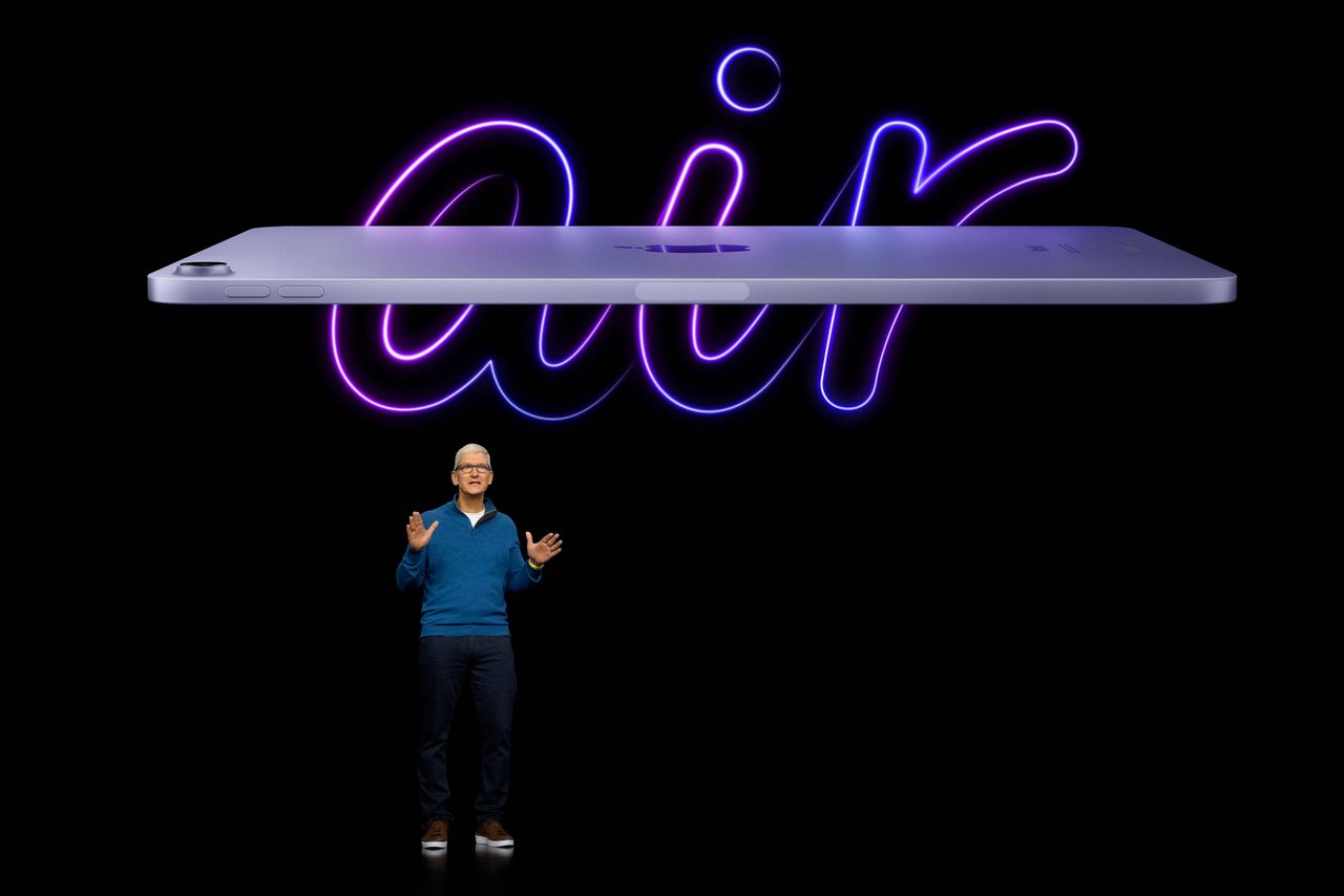 Apple CEO Tim Cook unveils the new iPad Air during a special event at Apple Park in Cupertino, California, U.S. broadcast on March 8, 2022. Brooks Kraft/Apple Inc./Handout via REUTERS.