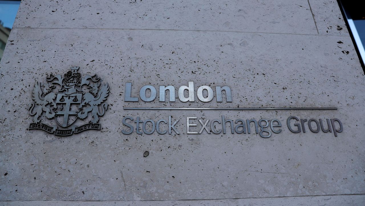 FILE PHOTO: Signage is seen outside the entrance of the London Stock Exchange in London, Britain. Aug 23, 2018. REUTERS/Peter Nicholls
