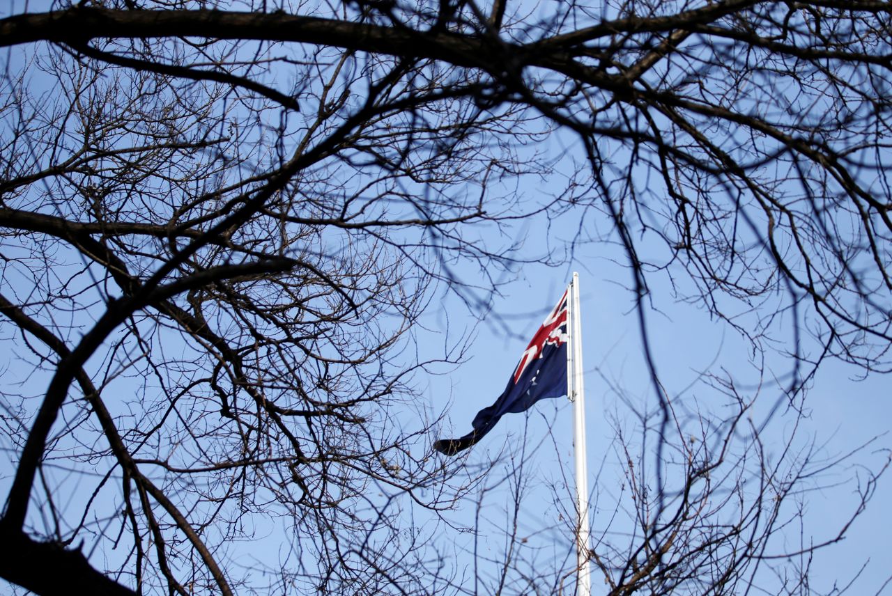 FILE PHOTO: An Australian flag is pictured at its embassy in Beijing, China January 24, 2019. REUTERS/Jason Lee