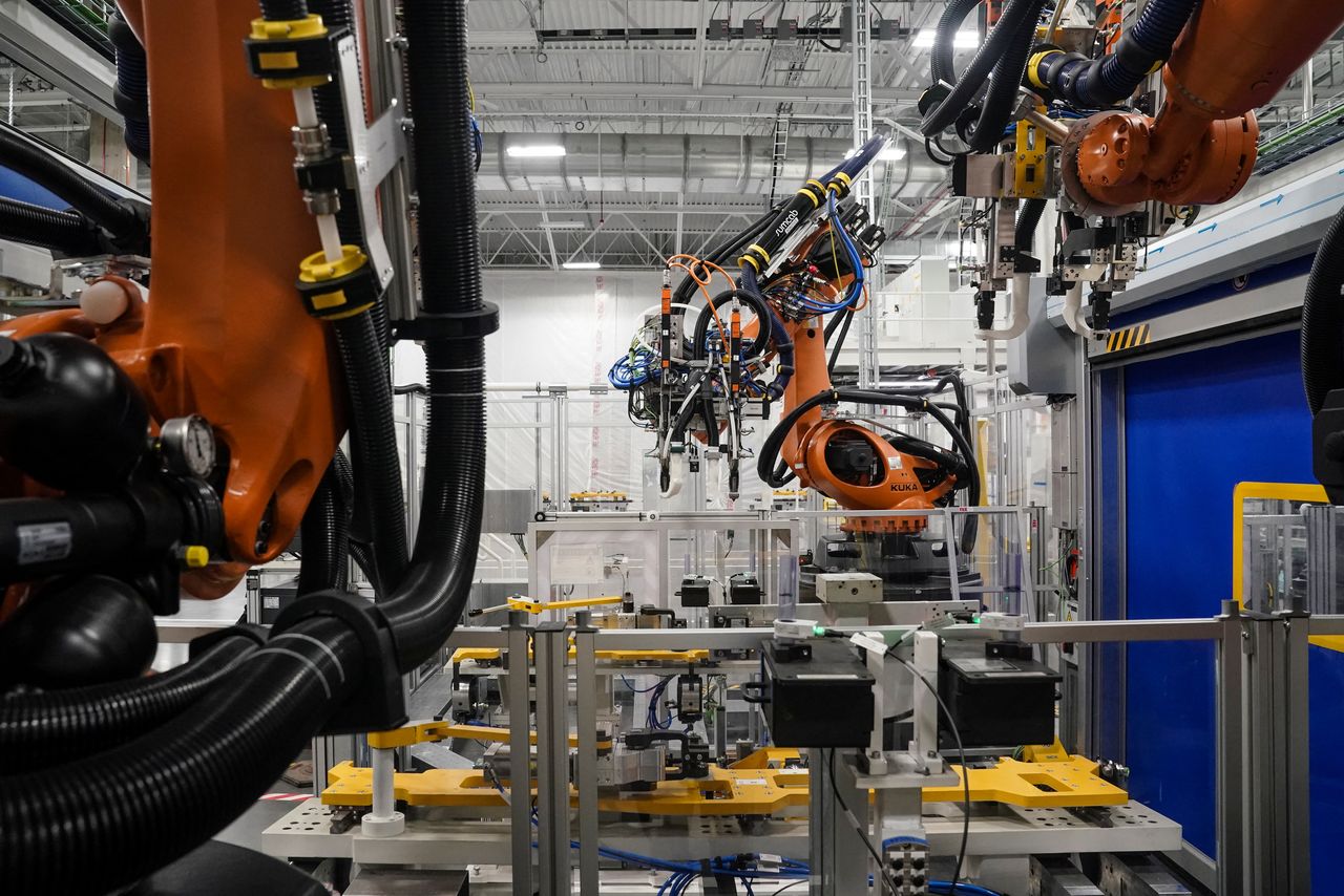 Machines are seen on a battery tray assembly line during a tour at the opening of a Mercedes-Benz electric vehicle Battery Factory, marking one of only seven locations producing batteries for their fully electric Mercedes-EQ models, in Woodstock, Alabama, U.S., March 15, 2022. REUTERS/Elijah Nouvelage