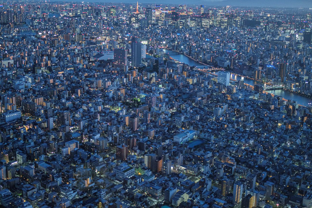 Office and residential buildings are seen from the observation deck of Tokyo Skytree, the world
