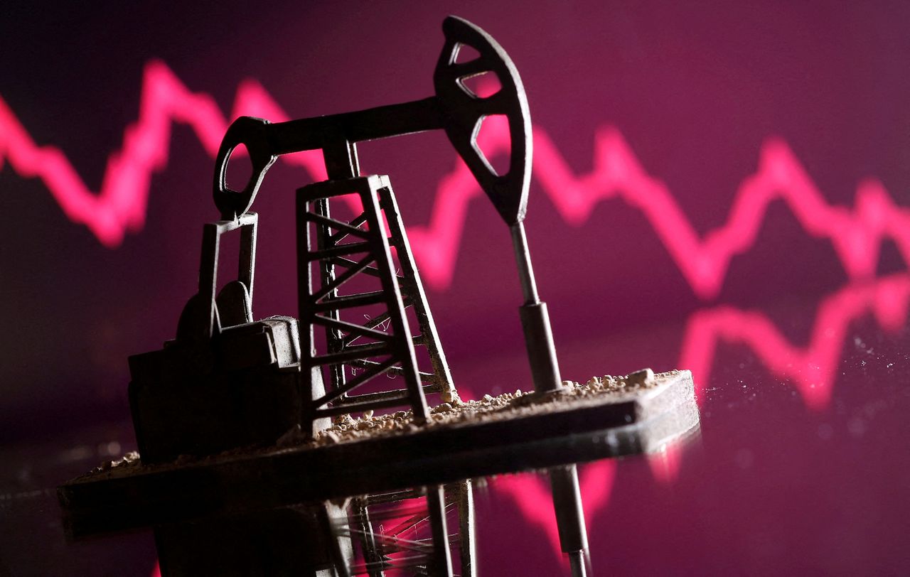 FILE PHOTO: A 3D-printed oil pump jack is seen in front of displayed stock graph in this illustration picture, April 14, 2020. REUTERS/Dado Ruvic/Illustration
