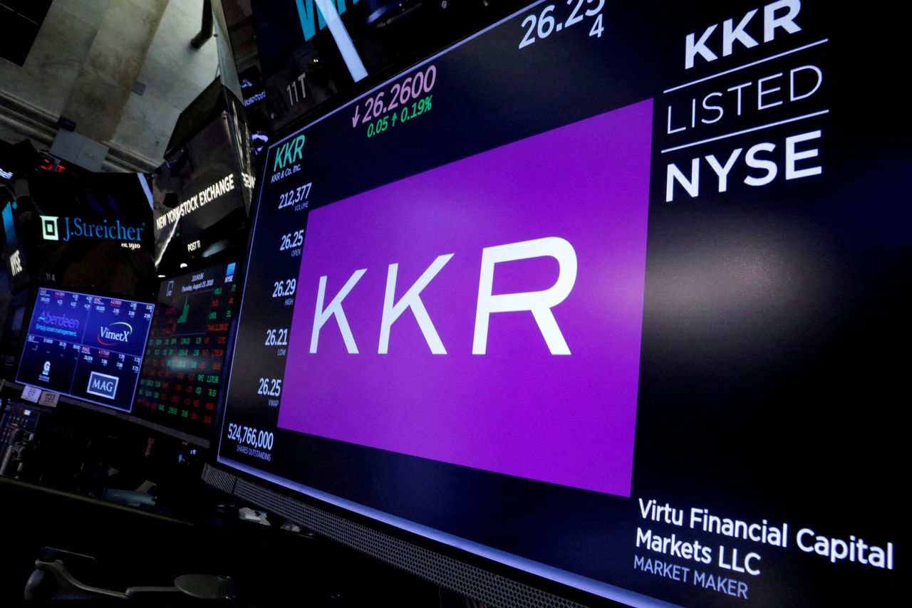 FILE PHOTO: Trading information for KKR & Co is displayed on a screen on the floor of the New York Stock Exchange (NYSE) in New York, U.S., August 23, 2018. REUTERS/Brendan McDermid