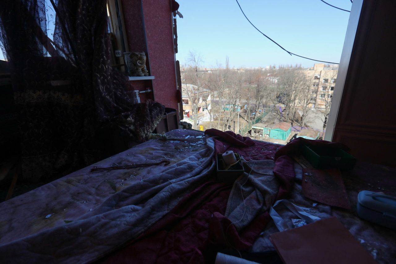 A view of a room in a residential building damaged by shelling, as Russia