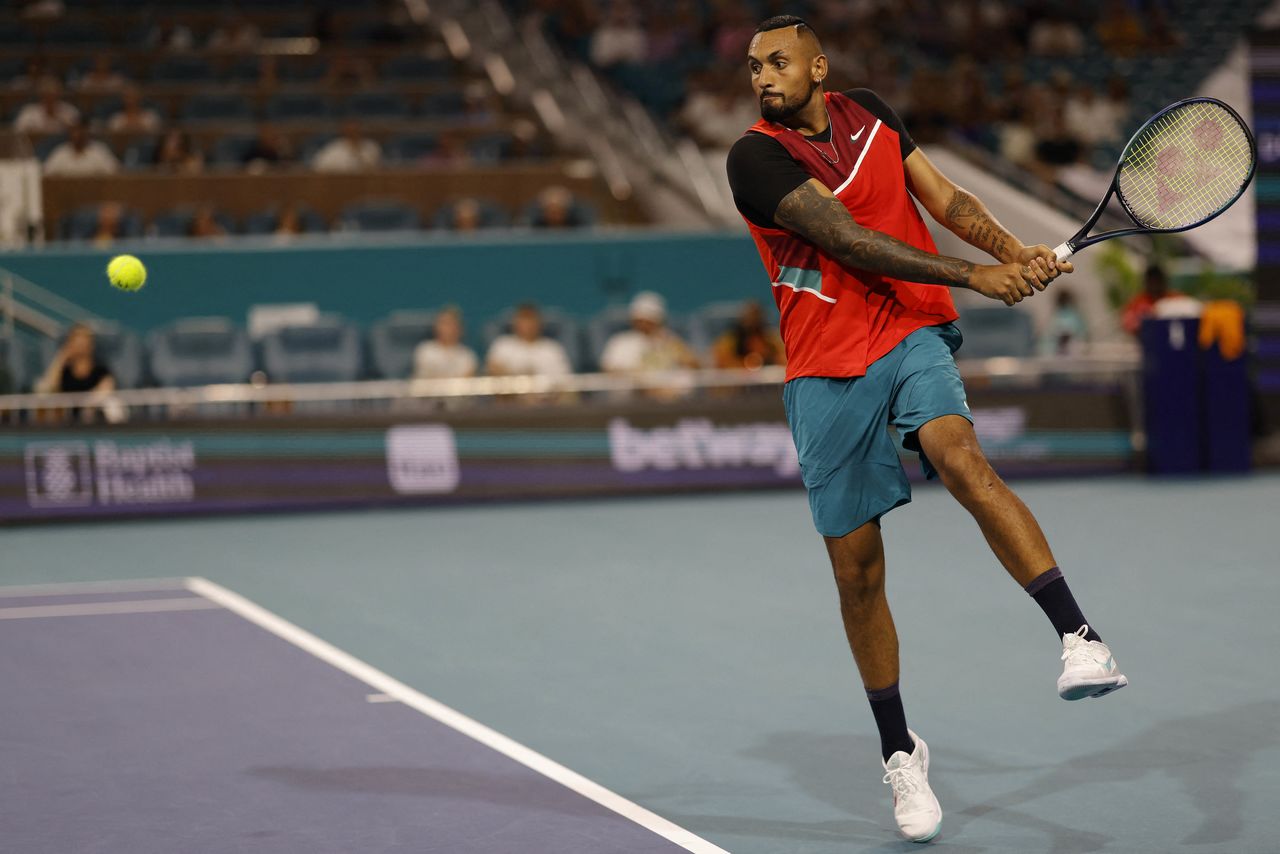 Mar 23, 2022; Miami Gardens, FL, USA; Nick Kyrgios (AUS) hits a backhand against Adrian Mannarino (FRA) (not pictured) in a first round men