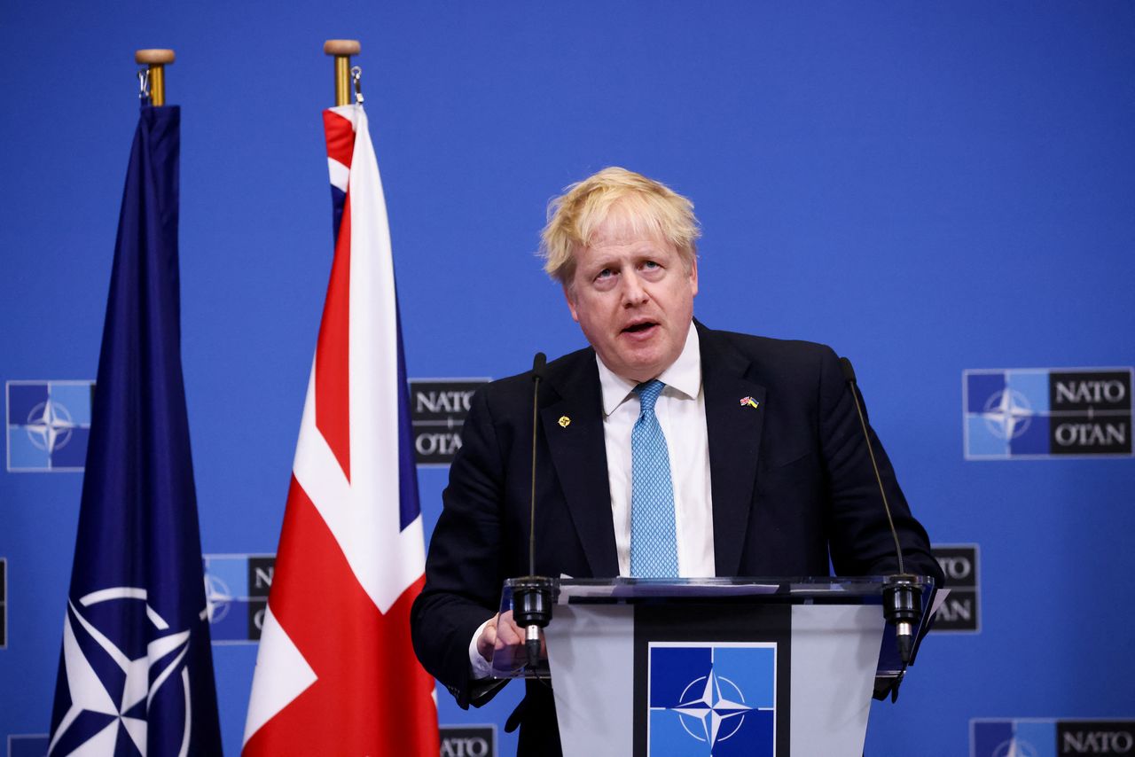British Prime Minister Boris Johnson speaks during a news conference following a NATO summit on Russia