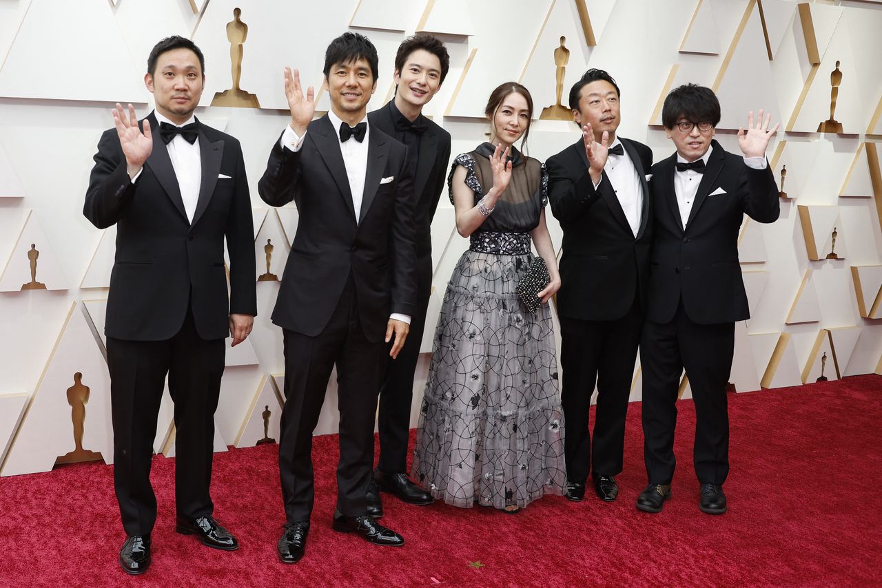 Director Ryusuke Hamaguchi of the film "Drive My Car" poses on the red carpet during the Oscars arrivals at the 94th Academy Awards in Hollywood, Los Angeles, California, U.S., March 27, 2022. REUTERS/Eric Gaillard