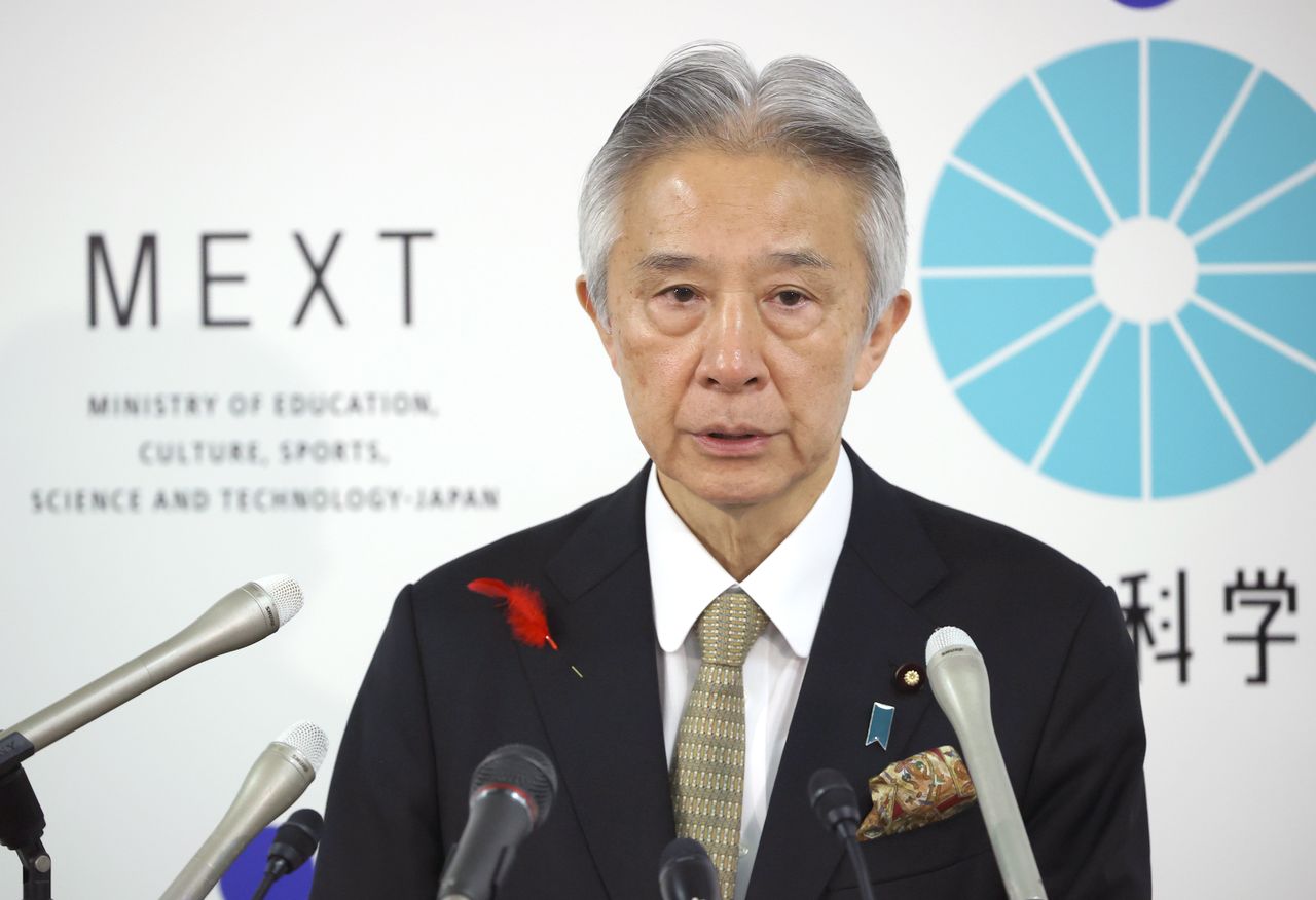 Minister of Education, Culture, Sports, Science, and Technology Moriyama Masahito holds a Tokyo press conference concerning the court order request on October 13, 2023. (© Jiji)