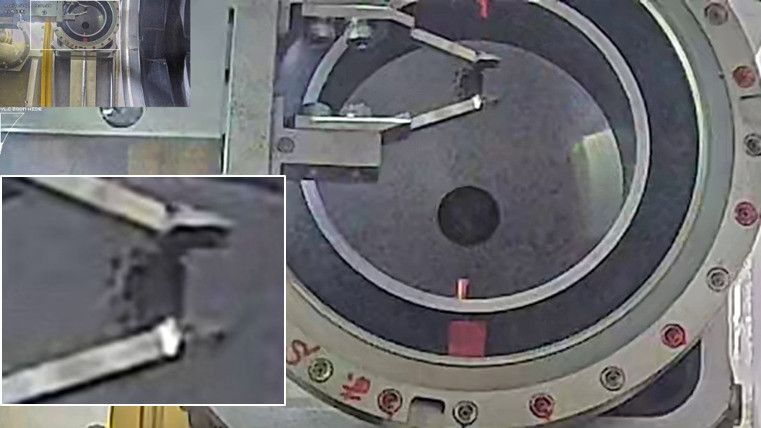 A 0.7-gram sample of nuclear debris removed from Fukushima Daiichi Nuclear Power Station and stored in a special container. (Courtesy Tokyo Electric Power Company; © Jiji)