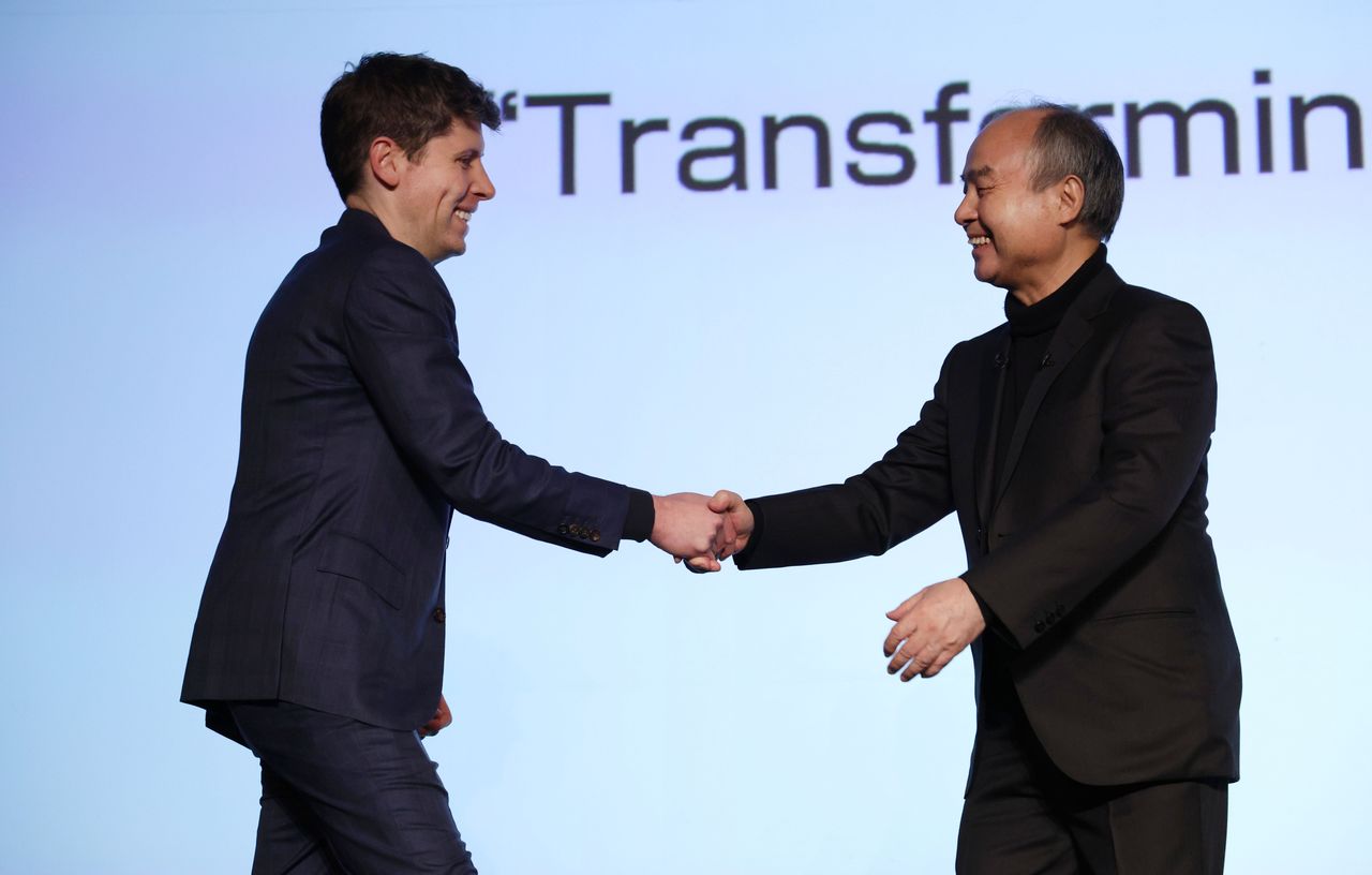 OpenAI CEO Sam Altman (left) shakes hands with SoftBank Chairman and CEO Son Masayoshi in Tokyo on February 3, 2025. (© Jiji)