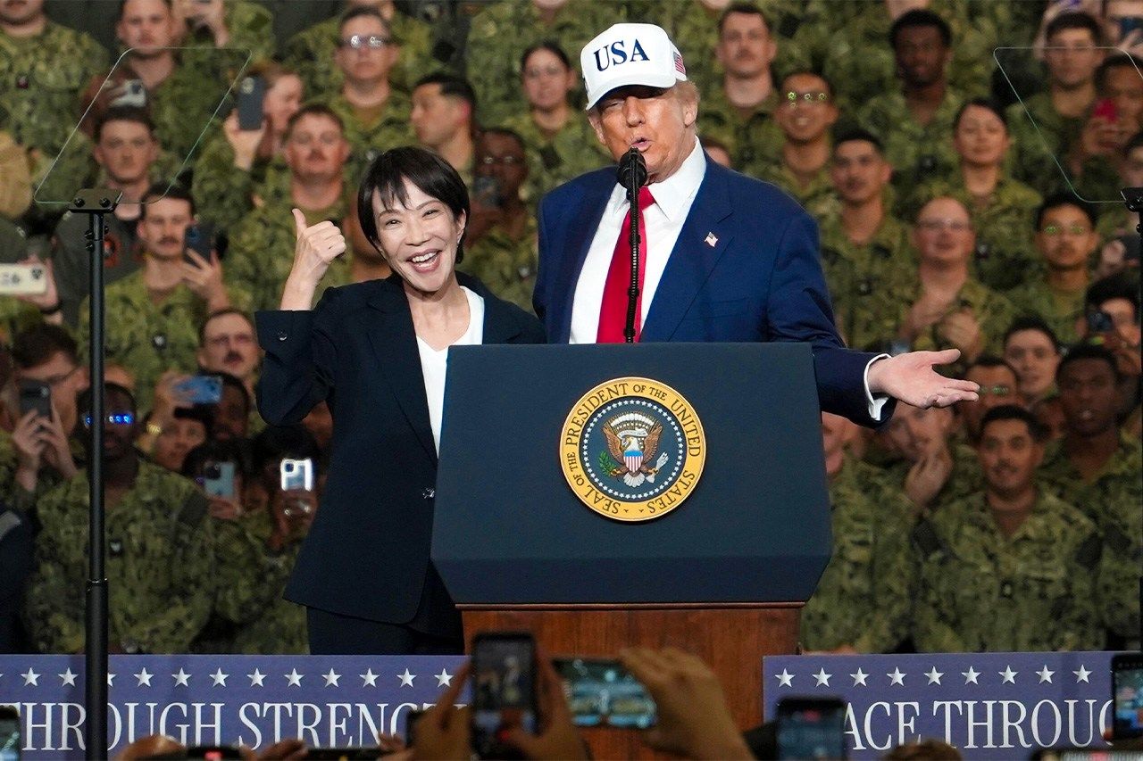 Prime Minister Takaichi Sanae poses with US President Donald Trump aboard the US Navy aircraft carrier George Washington in Yokosuka, Kanagawa, on October 28, 2025. (Pool photo; © Jiji)