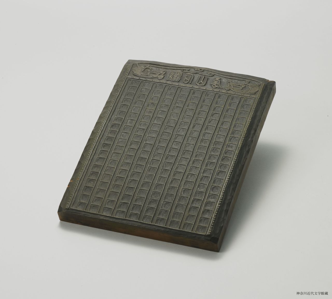 Natsume Sōseki’s printing block for preparing customized paper for serialized newspaper stories. (© Kanagawa Museum of Modern Literature)