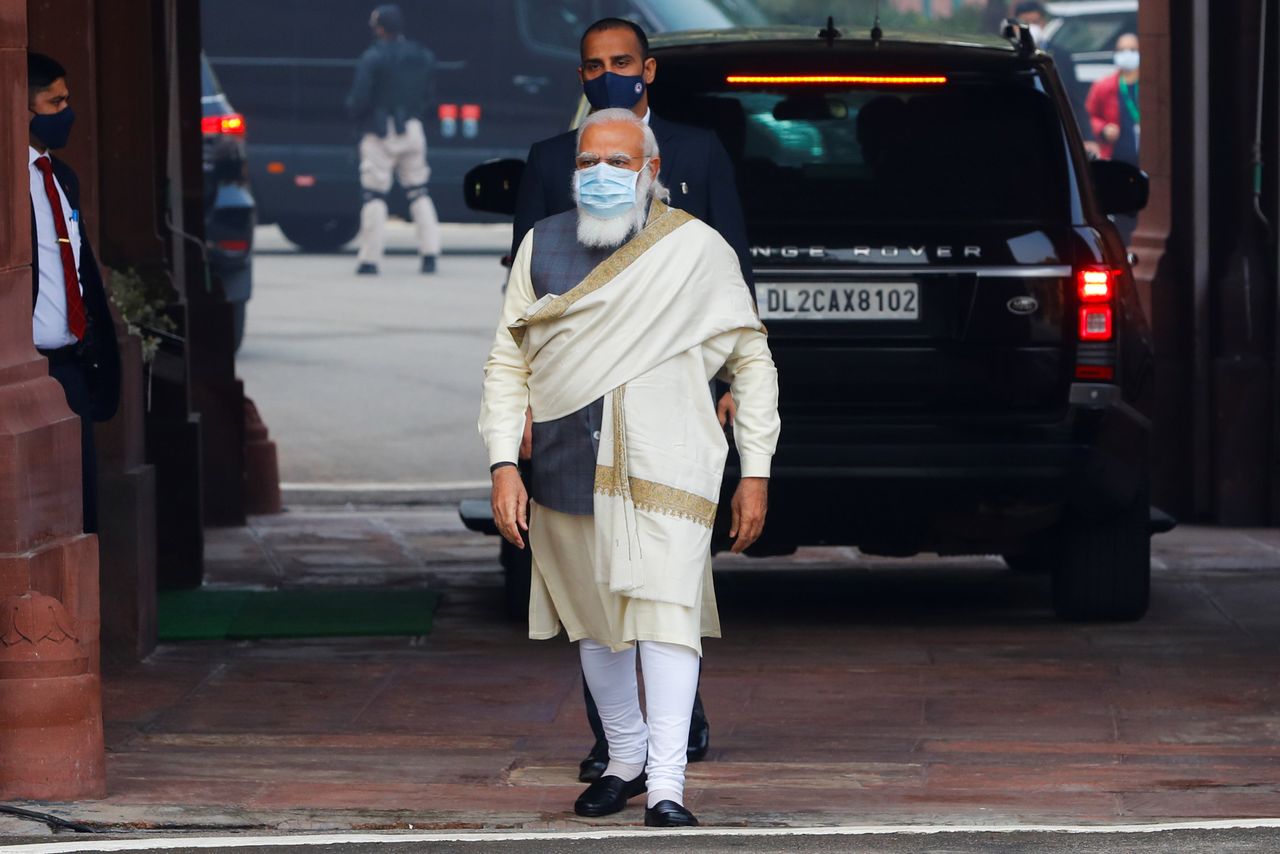 FILE PHOTO: India's Prime Minister Narendra Modi walks to speak with the media as he arrives at the parliament house to attend the first day of the budget session, in New Delhi, India, January 29, 2021. REUTERS/Adnan Abidi