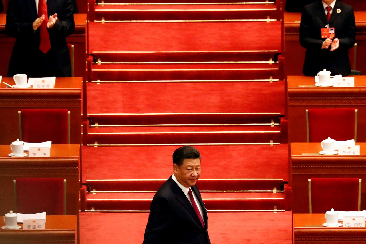 FILE PHOTO: Chinese President Xi Jinping arrives for the opening session of the National People's Congress (NPC) at the Great Hall of the People in Beijing, China March 5, 2018. REUTERS/Damir Sagolj