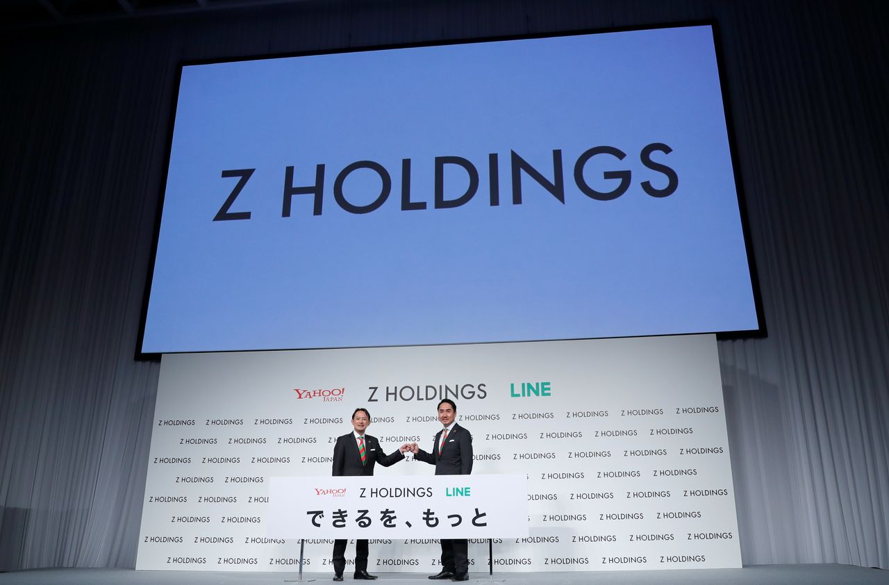 Co-CEOs of Z Holdings Kentaro Kawabe and Takeshi Idezawa hold a news conference in Tokyo, Japan, March 1, 2021. REUTERS/Kim Kyung-Hoon