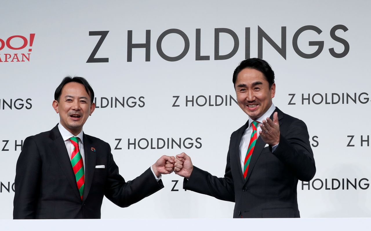 Co-CEOs of Z Holdings Kentaro Kawabe and Takeshi Idezawa hold a news conference in Tokyo, Japan, March 1, 2021. REUTERS/Kim Kyung-Hoon