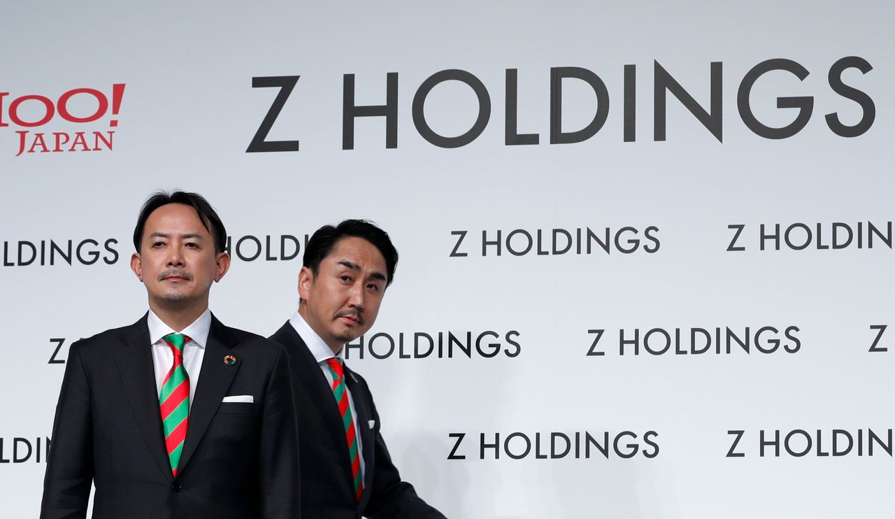 Co-CEOs of Z Holdings Kentaro Kawabe and Takeshi Idezawa hold a news conference in Tokyo, Japan, March 1, 2021. REUTERS/Kim Kyung-Hoon