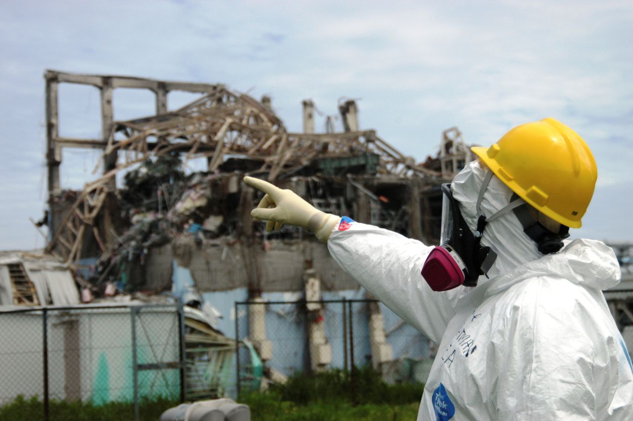FILE PHOTO: International Atomic Energy Agency (IAEA) fact-finding team leader Mike Weightman examines Reactor Unit 3 at the Fukushima Daiichi Nuclear Power Plant May 27, 2011 to assess tsunami damage and study nuclear safety lessons that could be learned from the accident. REUTERS/IAEA Photo/Handout