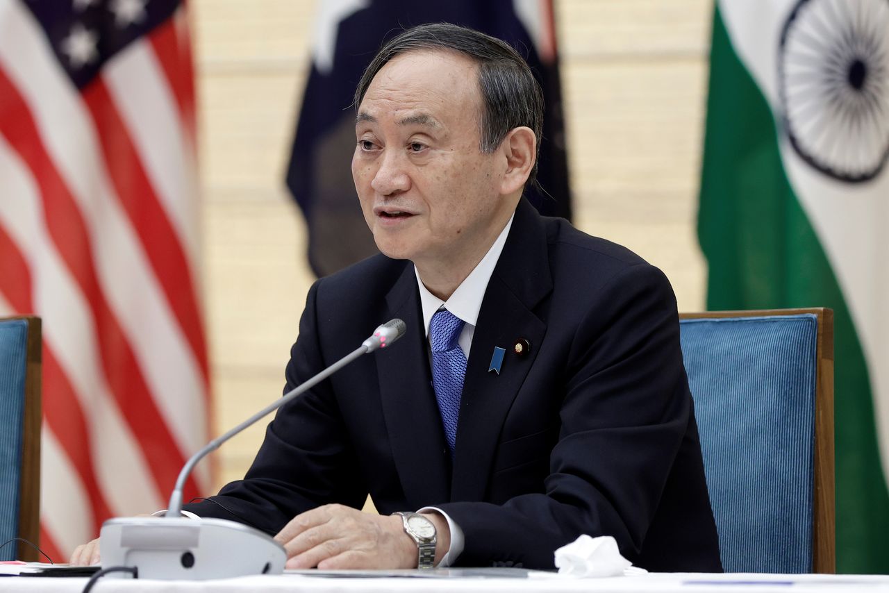 Yoshihide Suga, Japan's Prime Minister, speaks during the virtual Quadrilateral Security Dialogue (Quad) meeting at his official residence in Tokyo, Japan, on Friday, March 12, 2021. Kiyoshi Ota/Pool via REUTERS
