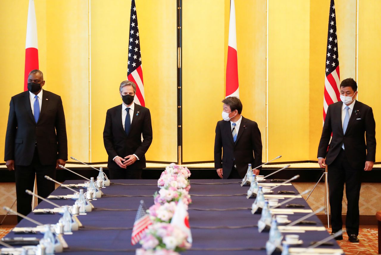 U.S. Secretary of State Antony Blinken, U.S. Defense Secretary Lloyd Austin, Japan's Foreign Minister Toshimitsu Motegi and Japan's Defence Minister Nobuo Kishi attend the 2+2 Meeting at Iikura Guest House in Tokyo, Japan, March 16, 2021. REUTERS/Kim Kyung-Hoon/Pool