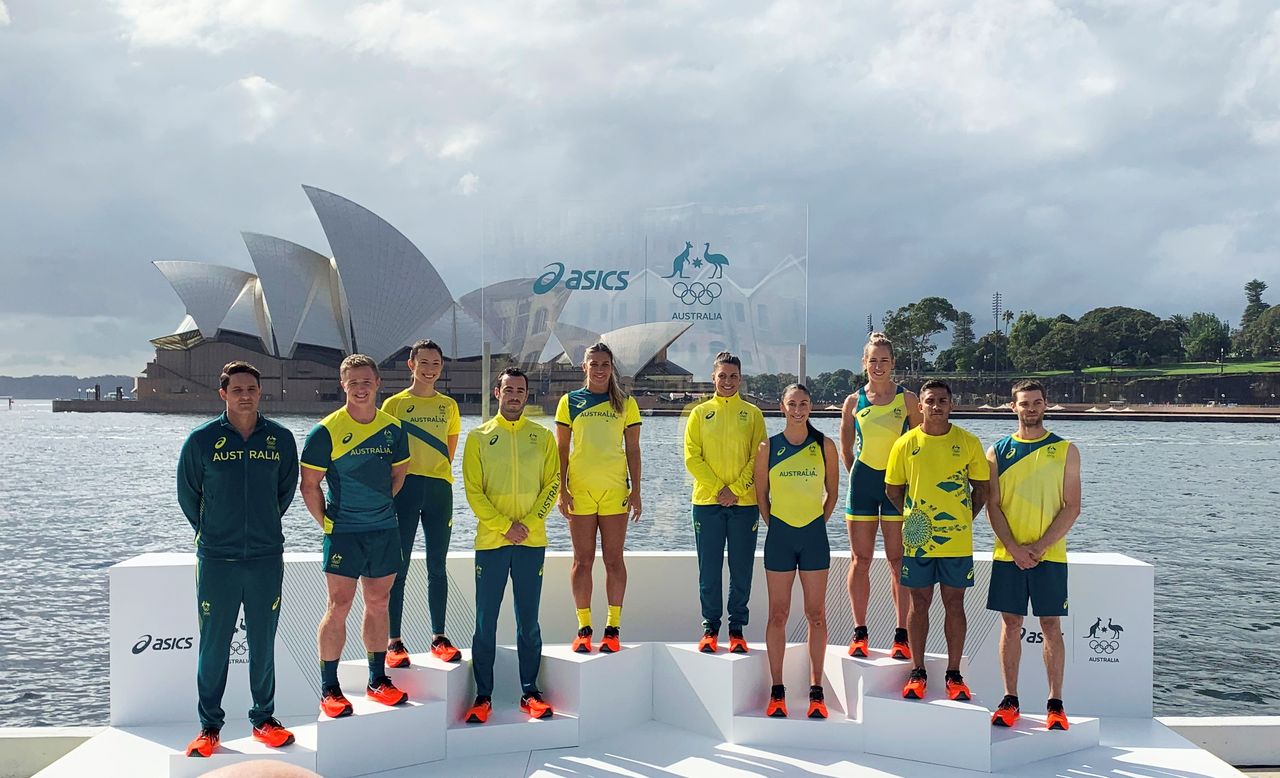 Australian Olympians pose in front of the Sydney Opera House at the unveiling of the team uniforms for the 2020 Tokyo Olympics, in Sydney, Australia March 31, 2021. REUTERS/Nick Mulvenney