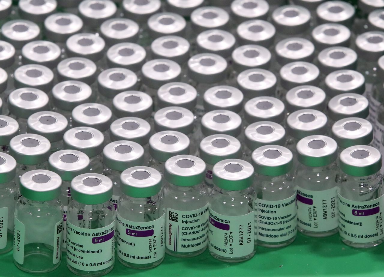 FILE PHOTO: Empty vials of Oxford/AstraZeneca's COVID-19 vaccine are seen at a vaccination centre in Antwerp, Belgium March 18, 2021. REUTERS/Yves Herman/File Photo