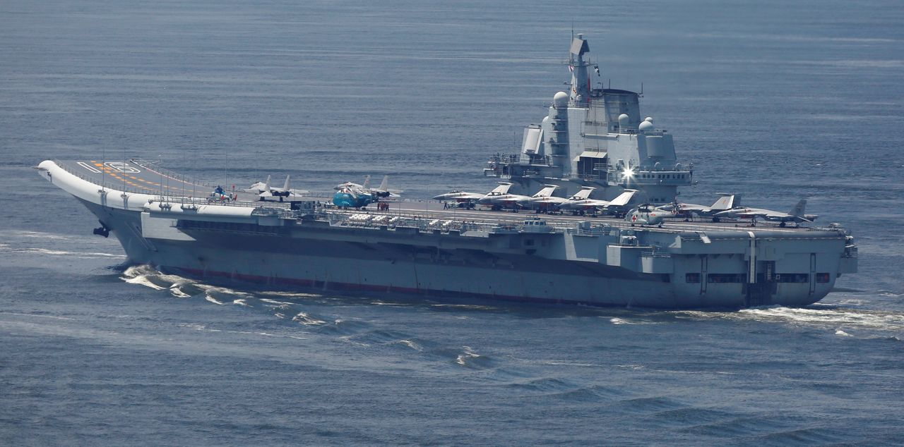 FILE PHOTO: China's aircraft carrier Liaoning departs Hong Kong, China, July 11, 2017. REUTERS/Bobby Yip/File Photo
