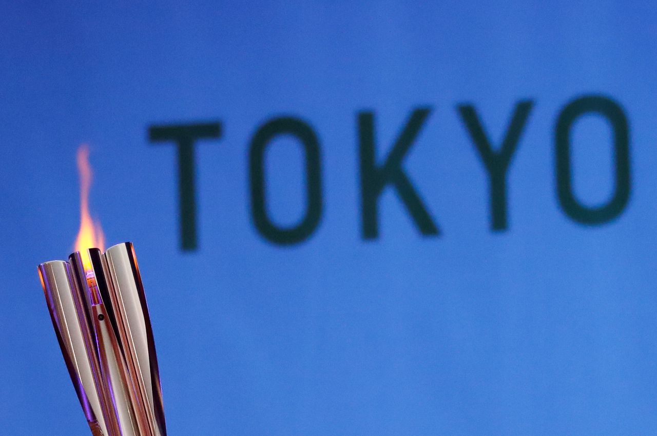 FILE PHOTO: The Olympic torch is seen at Hibarigahara Festival Site, during the last leg of the first day of the Tokyo 2020 Olympic torch relay, in Minamisoma, Fukushima prefecture, Japan, March 25, 2021. REUTERS/Issei Kato/File Photo