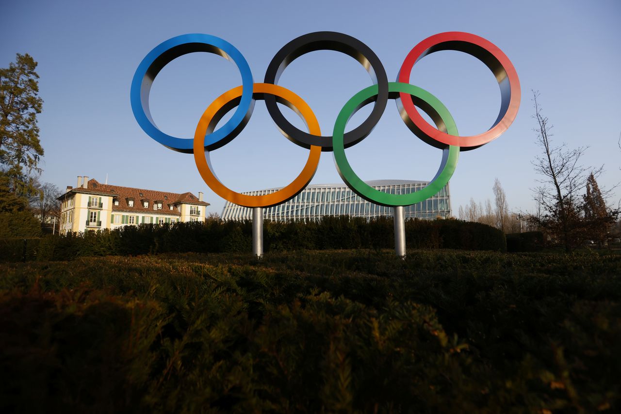 FILE PHOTO: The Olympic rings are pictured in front of the International Olympic Committee (IOC) headquarters during the coronavirus disease (COVID-19) outbreak in Lausanne, Switzerland, February 24, 2021. REUTERS/Denis?Balibouse