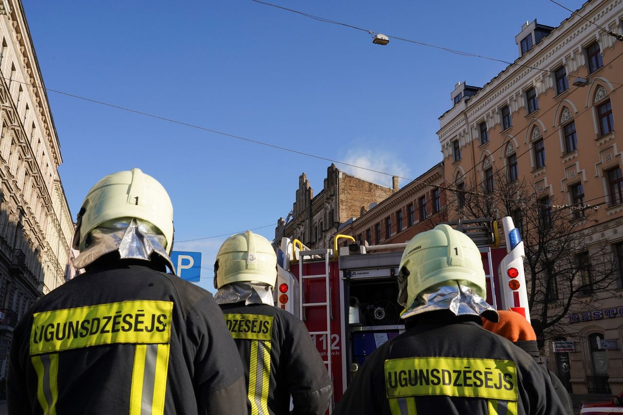 Firefighters respond to a deadly fire in a hostel in Riga, Latvia April 28, 2021. REUTERS/Janis Laizans
