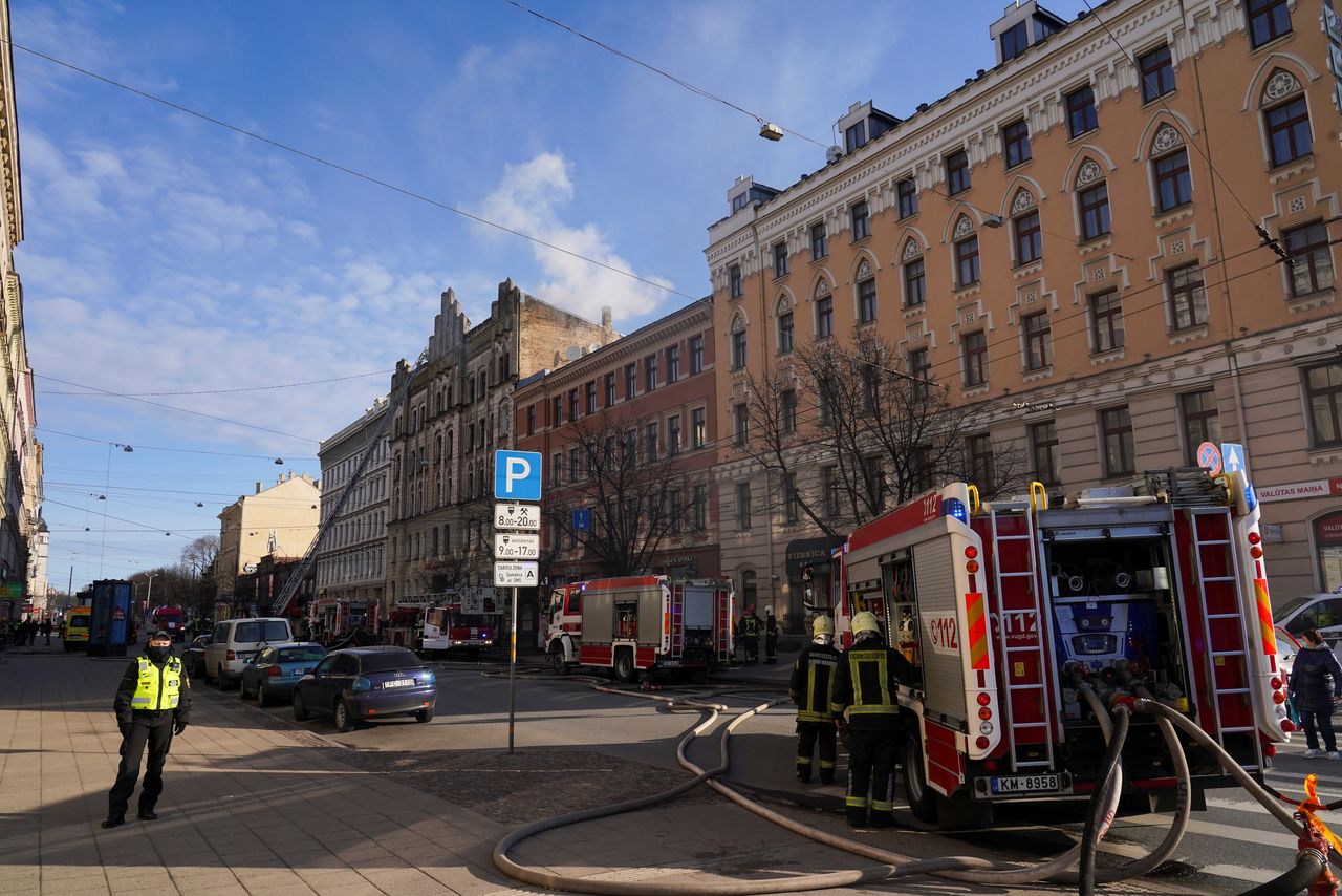 Firefighters respond to a deadly fire in a hostel in Riga, Latvia April 28, 2021. REUTERS/Janis Laizans