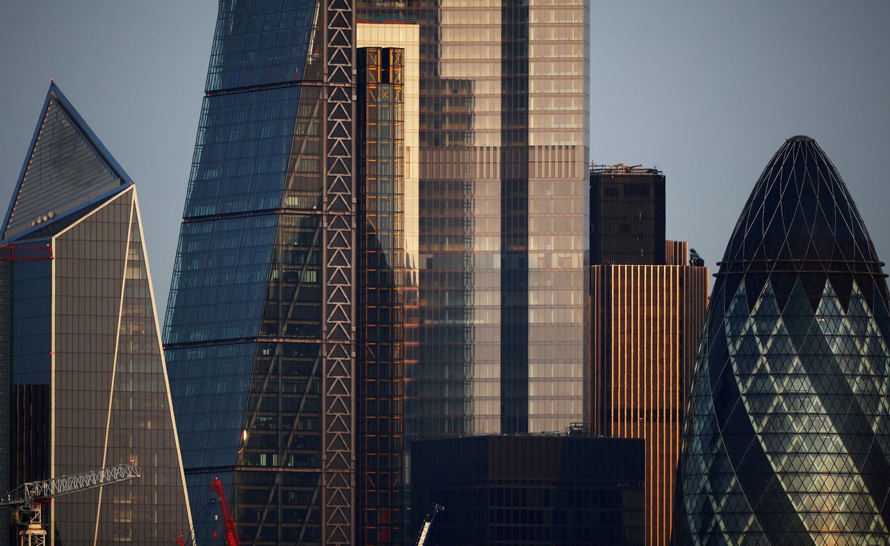 FILE PHOTO: Skyscrapers in The City of London financial district are seen in London, Britain, September 14, 2020. REUTERS/Hannah McKay
