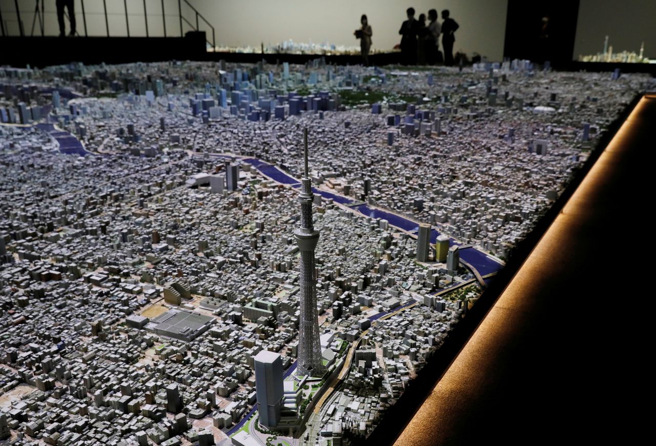 FILE PHOTO: A miniature of Tokyo Sky Tree, is seen on a 1:1000 scale version of Tokyo at Mori Building Urban Lab in Tokyo, Japan, April 26, 2021. Picture taken April 26, 2021. REUTERS/Kim Kyung-Hoon