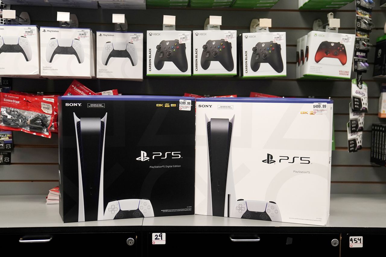 FILE PHOTO: Inside a GameStop store Sony PS5 gaming consoles are pictured in the Manhattan borough of New York City, New York, U.S., November 12, 2020. REUTERS/Carlo Allegri