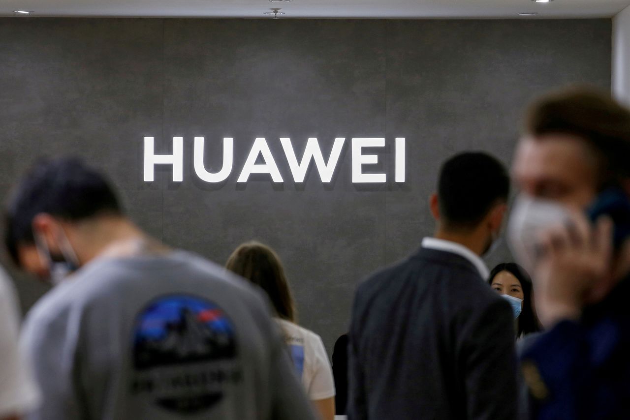 FILE PHOTO: The Huawei logo is seen at the IFA consumer technology fair, in Berlin, Germany September 3, 2020. REUTERS/Michele Tantussi/File Photo