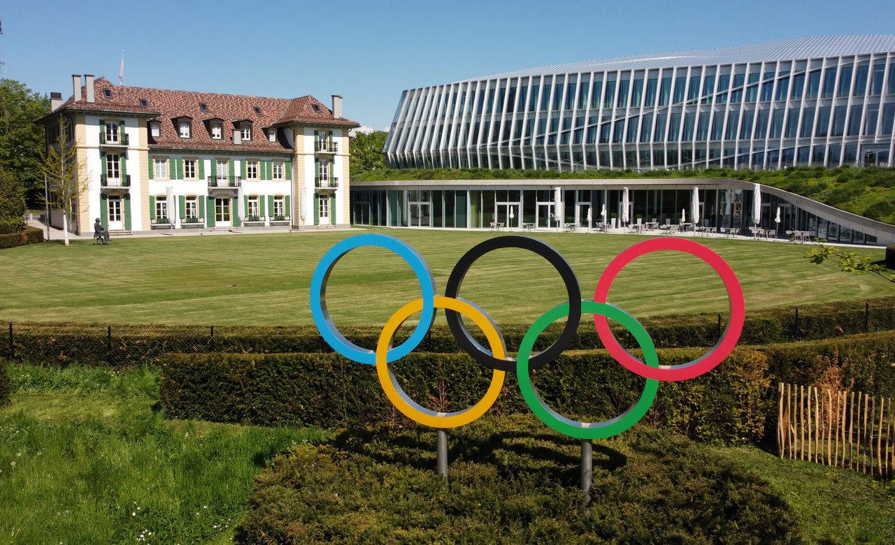 FILE PHOTO: The Olympic rings are pictured in front of the International Olympic Committee (IOC) headquarters in Lausanne, Switzerland, May 3, 2021. Picture taken with a drone. REUTERS/Denis Balibouse