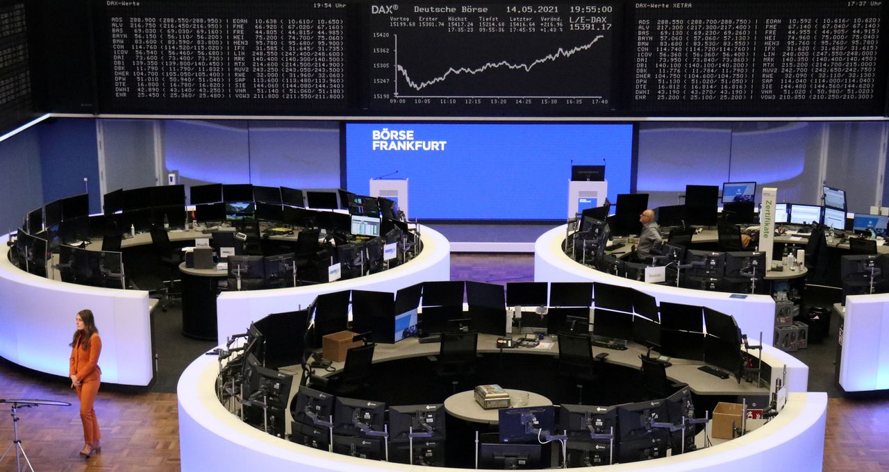 FILE PHOTO: The German share price index DAX graph is pictured at the stock exchange in Frankfurt, Germany, May 14, 2021. REUTERS/Staff