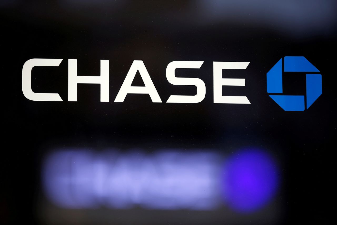FILE PHOTO: The logo of Dow Jones Industrial Average stock market index listed company Chase (JPM) is seen in Los Angeles, California, United States, April 25, 2016. JPMorgan Chase & Co. owns Chase Commerical Bank and JPMorgan Investment Bank. REUTERS/Lucy Nicholson/File Photo