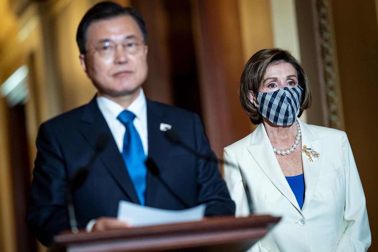 U.S. House Speaker Nancy Pelosi listens as South Korean President Moon Jae-in speaks during a meeting at the U.S. Capitol in Washington, U.S., May 20, 2021. Jabin Botsford/Pool via REUTERS