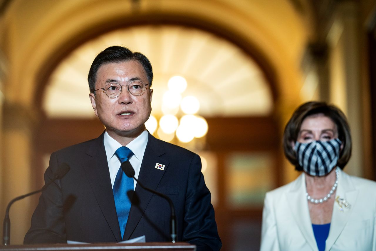 South Korean President Moon Jae-in speaks as U.S. House Speaker Nancy Pelosi listens during a meeting at the U.S. Capitol in Washington, U.S., May 20, 2021. Jabin Botsford/Pool via REUTERS
