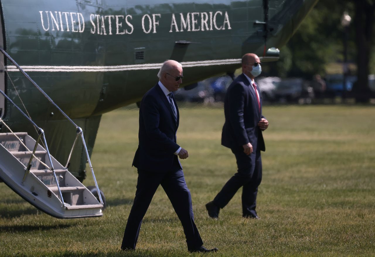FILE PHOTO: U.S. President Joe Biden exits Marine One helicopter upon his return from a day trip to the Coast Guard Academy back to the Ellipse at the White House in Washington, U.S., May 19, 2021. REUTERS/Leah Millis