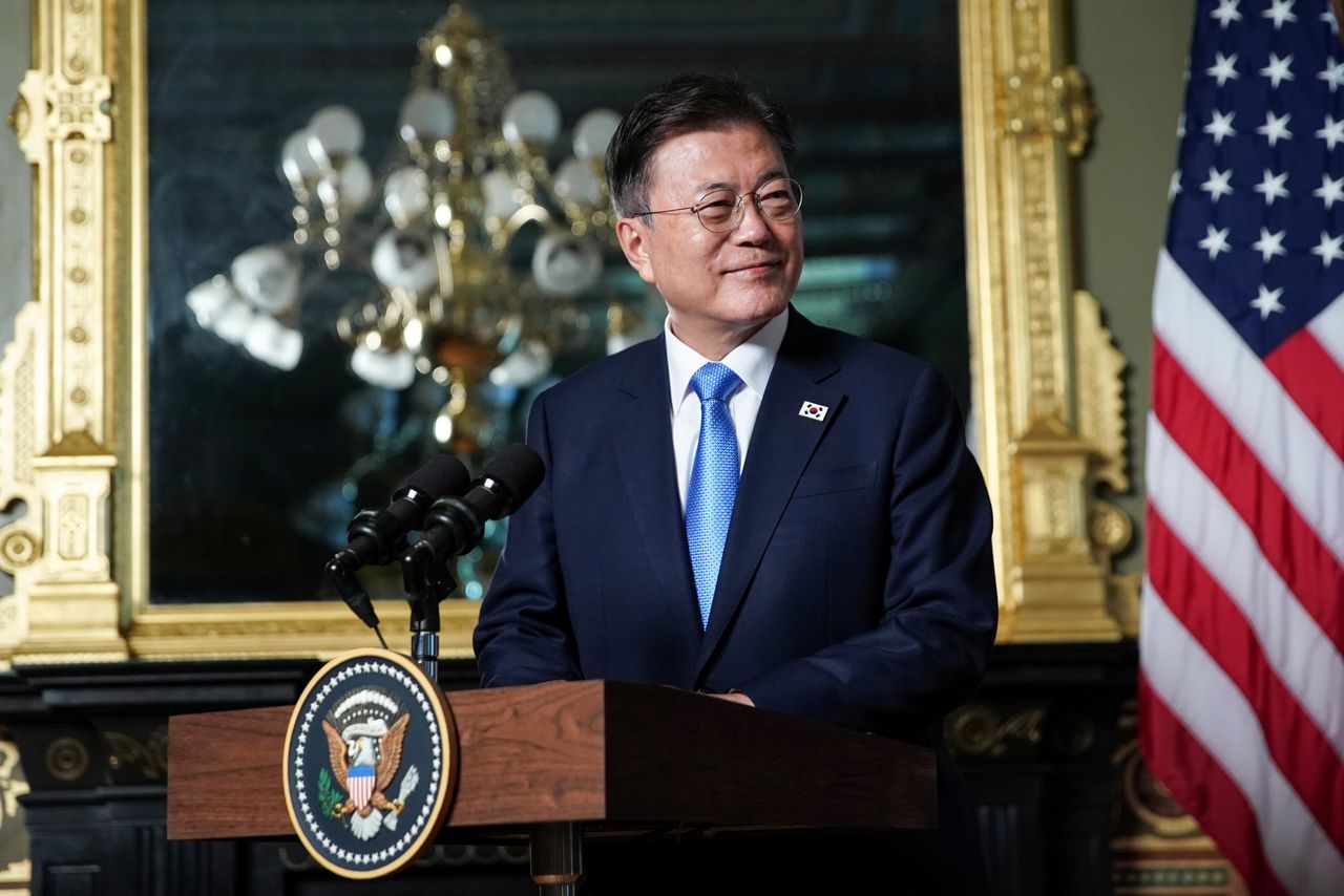 South Korean President Moon Jae-in delivers remarks with U.S. Vice president Kamala Harris before participating in a bilateral meeting at the Eisenhower Executive Office Building near the White House in Washington, U.S., May 21, 2021. REUTERS/Sarah Silbiger