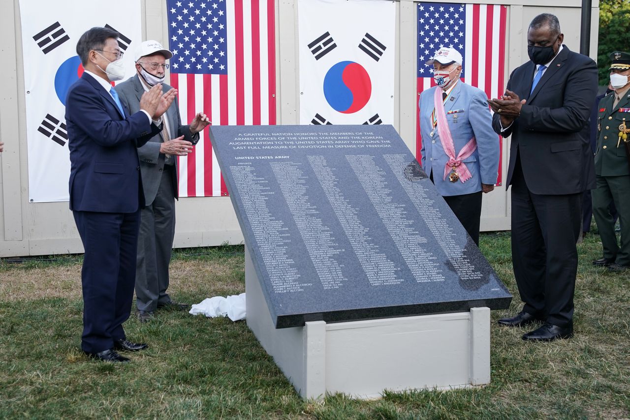 South Korean President Moon Jae-in and Secretary of Defense Lloyd Austin participate in a Korean War Veterans Memorial Wall of Remembrance ground breaking ceremony on the National Mall in Washington, U.S., May 21, 2021. REUTERS/Sarah Silbiger