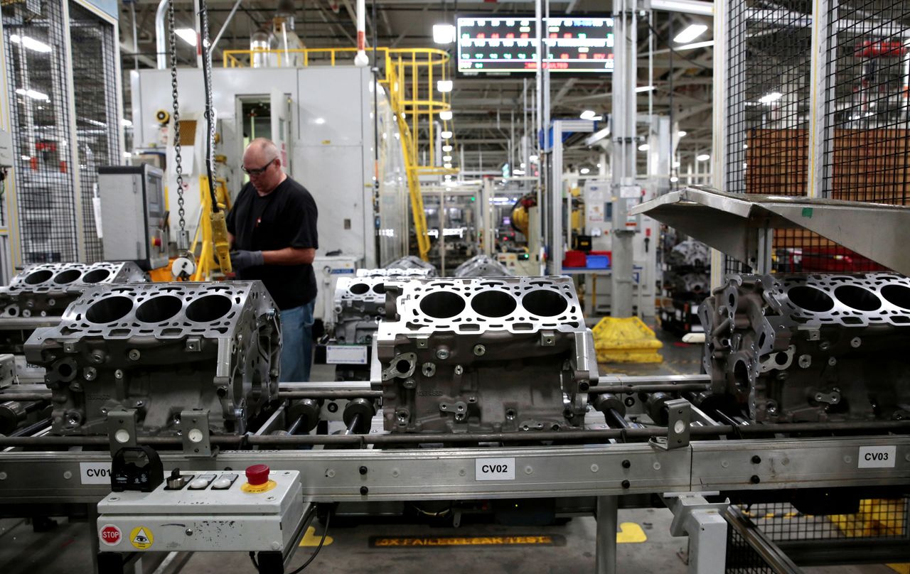 FILE PHOTO: Engine casting blocks, used in a variety of General Motors cars, trucks and crossovers, move down the assembly line at the GM Romulus Powertrain plant in Romulus, Michigan, U.S. August 21, 2019. Rebecca Cook/File Photo