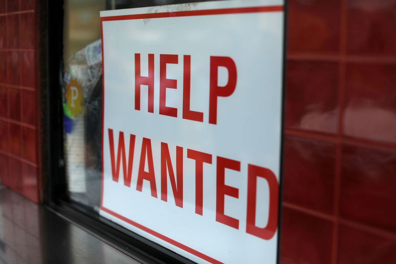 FILE PHOTO: A help wanted sign is posted at a taco stand in Solana Beach, California, U.S., July 17, 2017. REUTERS/Mike Blake/File Photo