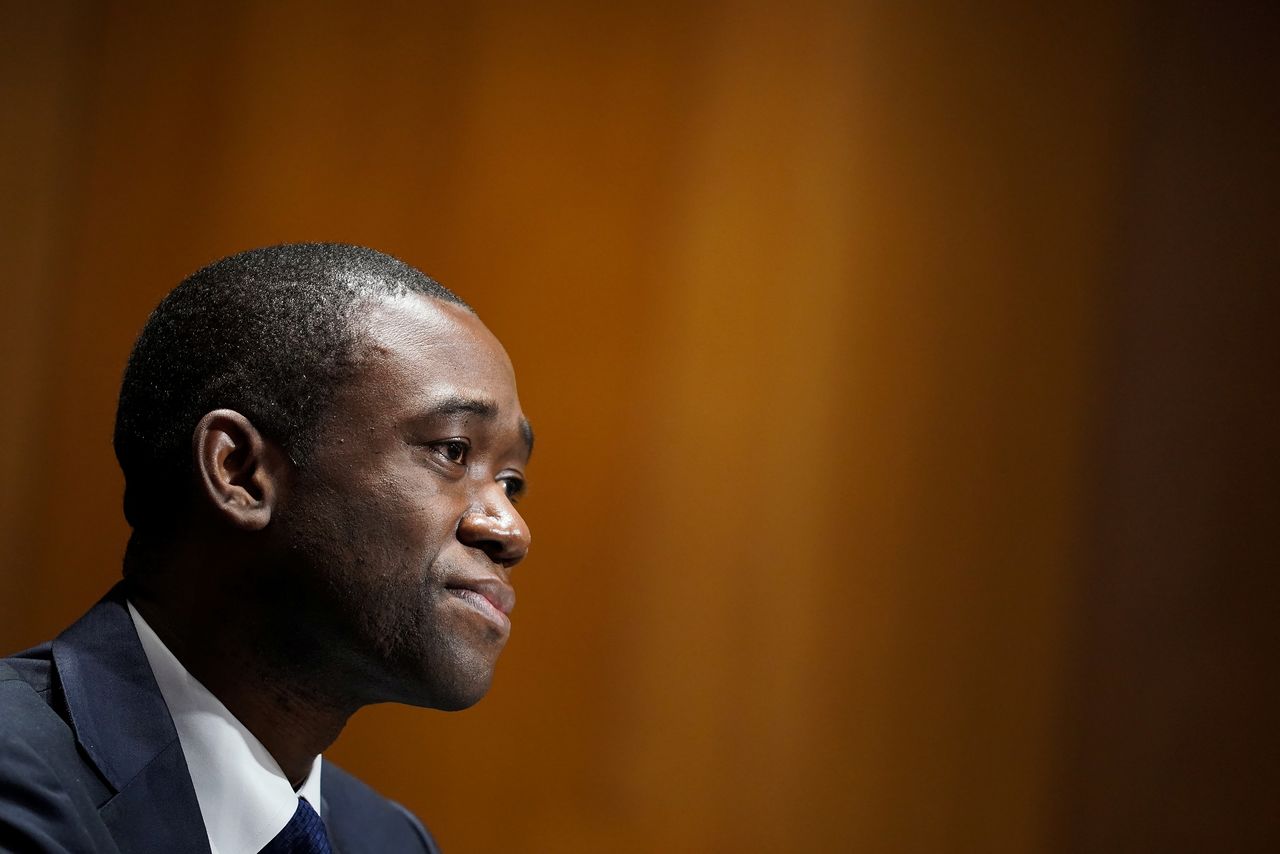 FILE PHOTO: Economist Adewale "Wally" Adeyemo listens to questions during his Senate Finance Committee nomination hearing to be Deputy Secretary of the Treasury in the Dirksen Senate Office Building, in Washington, D.C., U.S., February 23, 2021. Greg Nash/Pool via REUTERS