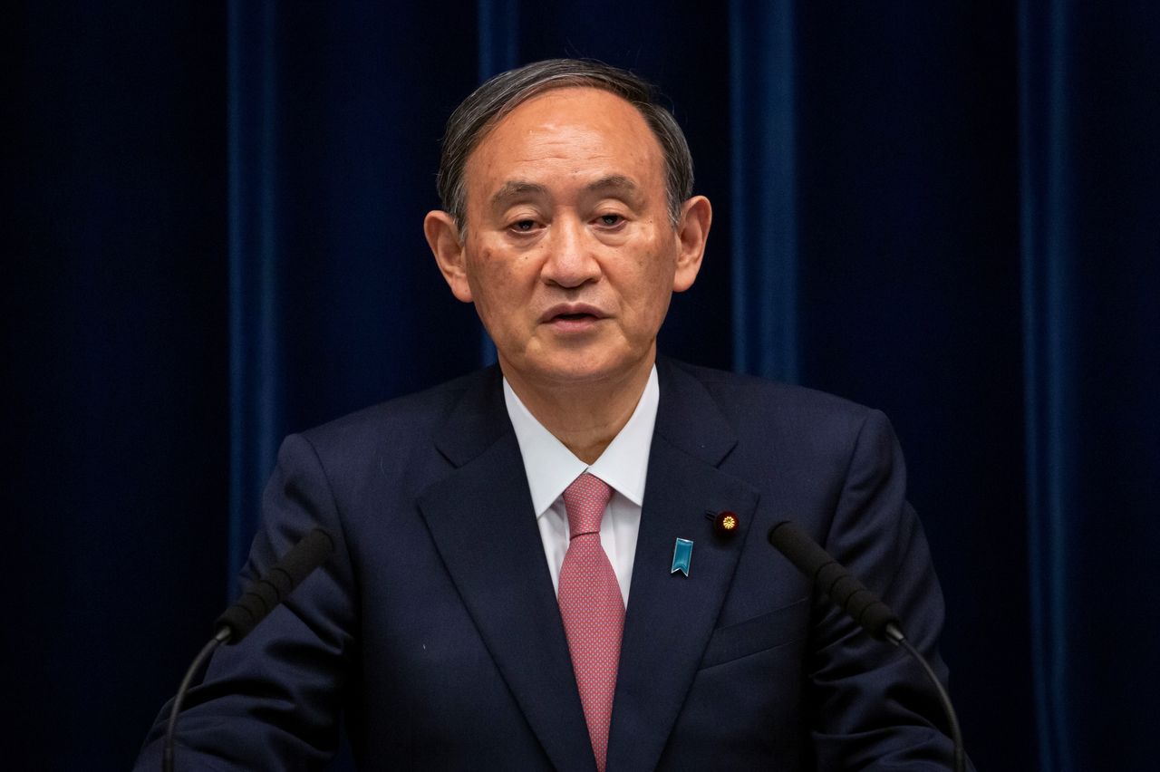 FILE PHOTO: Japanese Prime Minister Yoshihide Suga speaks during a news conference on the coronavirus disease (COVID-19) emergency measures, at the Prime Minister
