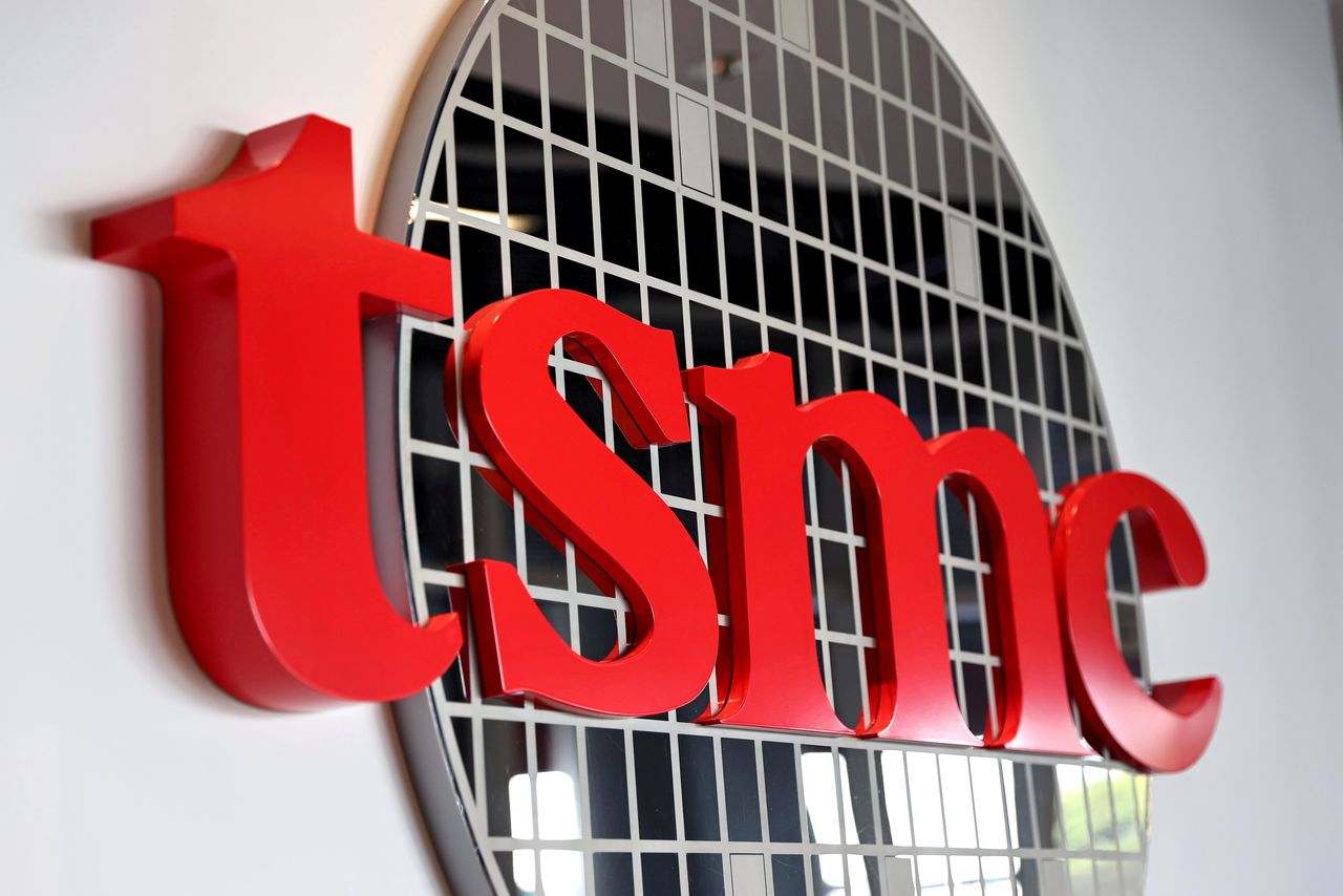 FILE PHOTO: The logo of Taiwan Semiconductor Manufacturing Co (TSMC) is pictured at its headquarters, in Hsinchu, Taiwan, Jan. 19, 2021. REUTERS/Ann Wang/File Photo