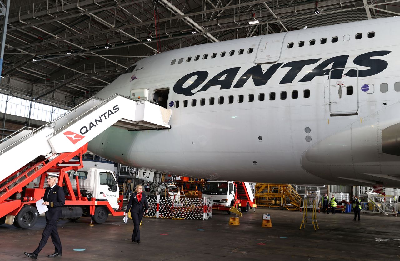 FILE PHOTO: Qantas, which is retiring its remaining Boeing 747 planes early due to the coronavirus disease (COVID-19) pandemic, celebrates the departure of its last 747 jumbo jet from the Sydney Airport in Sydney, Australia, July 22, 2020. REUTERS/Loren Elliott