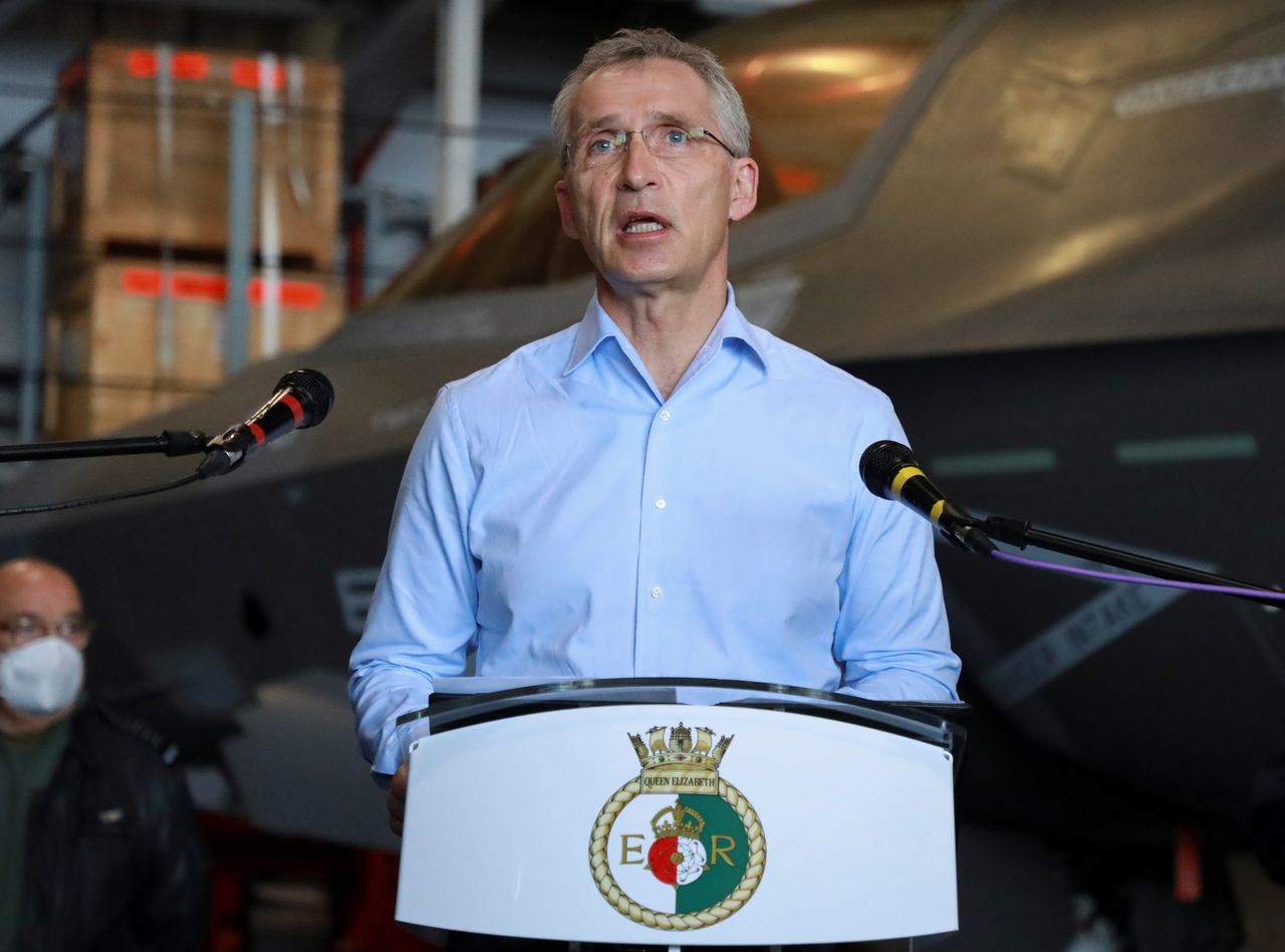NATO Secretary General Jens Stoltenberg speaks on board the HMS Queen Elizabeth aircraft carrier offshore Portugal, May 27, 2021. REUTERS/Bart Biesemans